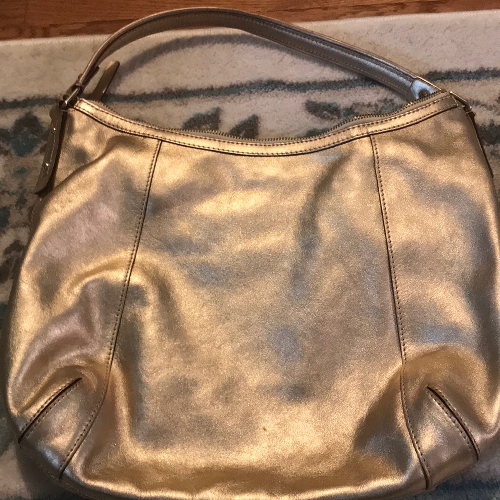 Kate Spade gold purse.